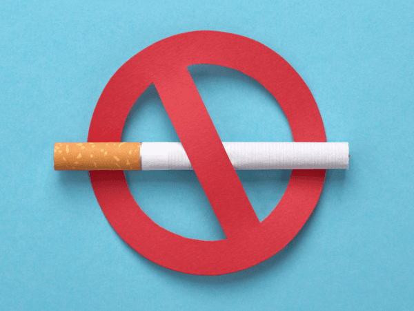 cigarette intertwined with a red no circle