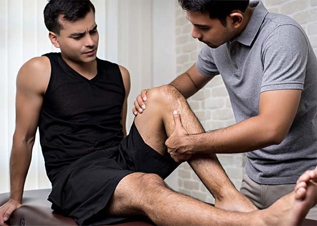 Male athlete receiving treatment